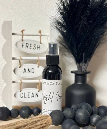 Designer-inspired room spray bottle styled with Fresh and Clean decor from Simply Serenity home fragrance collection