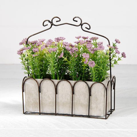 Small Purple Flowers In Scalloped Basket